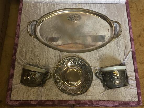 Pair embossed silver coffee cups and saucers, and a matching two handled tray (cased)